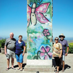 A piece of the Berlin Wall at the Reagan Library in Simi Valley. Left to right: Hap and Lynda Yoder, Jaine and Don Toth.