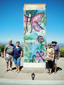 A piece of the Berlin Wall at the Reagan Library in Simi Valley. Left to right: Hap and Lynda Yoder, Jaine and Don Toth.