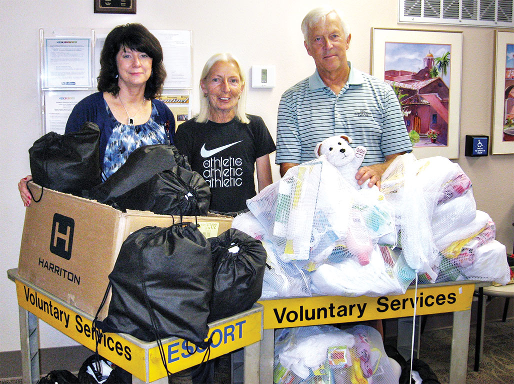 On June 12, 2014 SOT-AZ and Troop Appreciation Committee members Kathy Roche and Richard Harris delivered new baby bags and adult canteen bags to Tucson VA Volunteer Service Personnel.