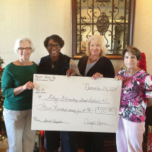 Members of the RR Ladies Social Club presented a check to the Eloy School District Superintendent.