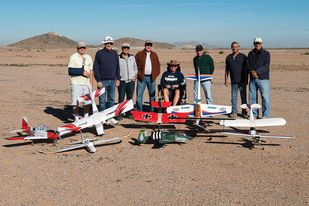 The motley crew showing off the club’s fleet.