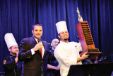 Mike Taylor, General Manager at Quail Creek, presents the winning trophy to the Robson Ranch Arizona team.