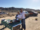 Robson Ranch resident Loretta Sutton and Roberto, both representing The Valley Humane Society, accepting cash and product donations from the flyers and visitors at the field.