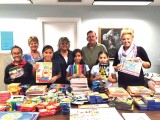 Left to right, back row: Beth Durfee and Janet Bloam, RR Pottery Guild, Toltec Superintendent Dr. Bryan Mccleney and third grade teacher Mrs. Allison; the front row consists of Toltec students.