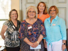 The group representing the charity/comfort quilt committee delivering quilts to Eloy Senior Center: Karen Karpinsky, Jane Schroer, Rebecca McKinny and Marge Doughty