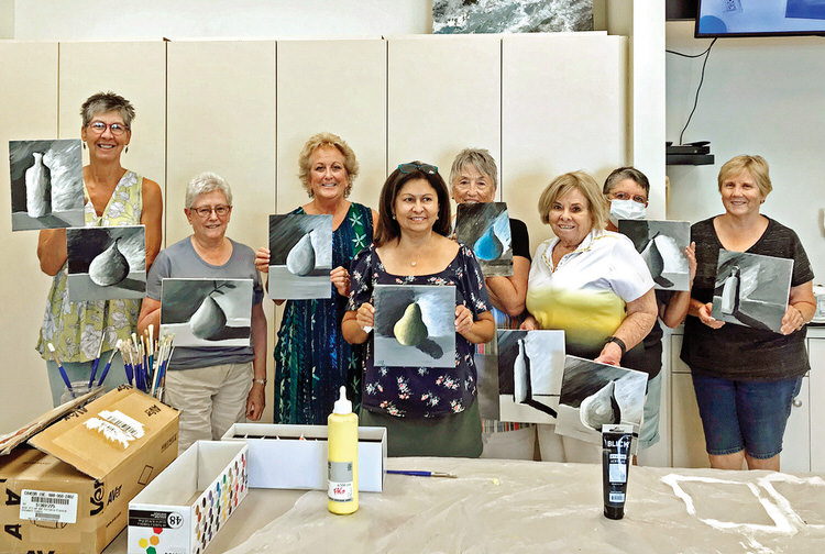 Practicing their shades of gray with Nils Johnson (left to right): Maryan Hopkins, Connie Wiletzky, Laurie Laramie, Mary Hogan, Mary Beth Fisher, Fran Fowler, Concepta Savage, and Margie Thompson
