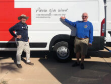 Butch Spiller, club president (left), and Bill Engler, club vice president (right), at the RC Club blood drive event.