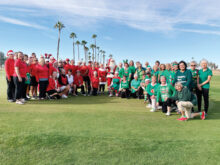 Both teams showed off their favorite color, with Santa in the middle, of course!