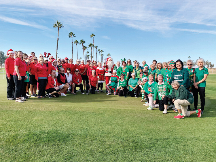 Both teams showed off their favorite color, with Santa in the middle, of course!