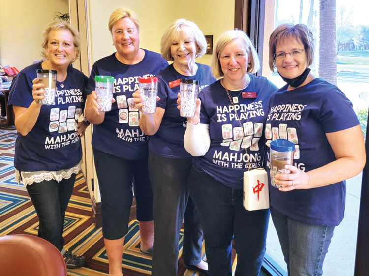 From left to right, Laurie Laramie, Jane Everett, Jill Mallory, Kim Miller, and Donna Toller in their Mah Jongg attire