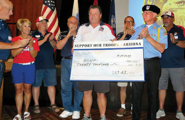 SOT–AZ presented a check for $20,000 to HOHP.