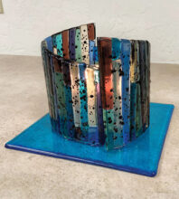 Multicolor votive on blue stand by Janet Krummann