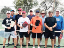Men's 4.0 Can Am Team—Winners, Casa Grande Division. Front row, left to right: Mark Shaughnessy, Allan Carpentier, Mike Fortin, and Rene Johnson. Back row, left to right: Team Captain Rob Barrett, Reg Lakness, Dave Barton, Kent Romeis, and Pat Kluckman. Not pictured: Kelvin Taylor.