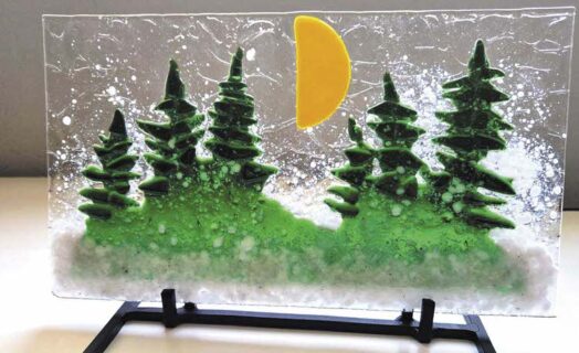 Forest with Christmas trees and half moon by Colleen Angle