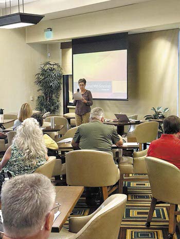 Regina Crisman introduces the seminar