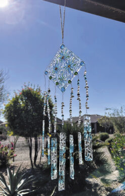 Clear blue flowers wind chimes byDonna Rhodes