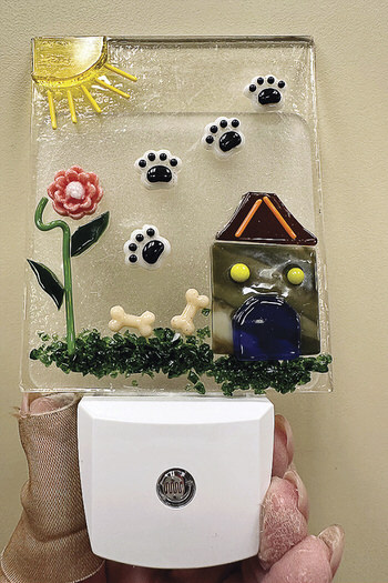 Dog house and paw prints nightlight by Bette Hinkley