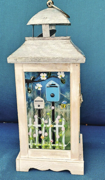 Picket fence and mail boxes lantern by Connie Drew